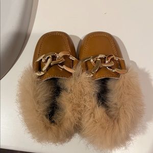 Toddler faux fur shoes size 5.